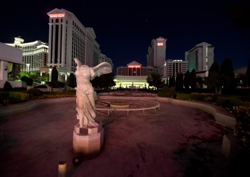 LAS VEGAS, NEVADA - APRIL 03: An exterior view shows a drained fountain area in front of Caesars Palace on the Las Vegas Strip as the resort remains closed as a result of the statewide shutdown due to the continuing spread of the coronavirus across the United States on April 3, 2020 in Las Vegas, Nevada. Nevada Gov. Steve Sisolak ordered a mandatory shutdown of most nonessential businesses in the state through April 30th to help combat the spread of the virus. On Thursday, Caesars Entertainment Corp., which operates 10 properties in Las Vegas, furloughed about 90 percent of its U.S. employees as a result of the closures. The World Health Organization declared the coronavirus (COVID-19) a global pandemic on March 11th.   Ethan Miller/Getty Images/AFP
