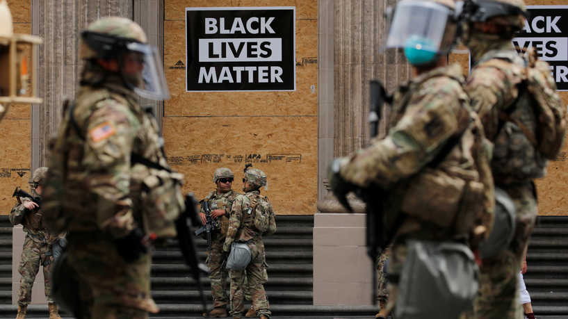 National Guard's members are seen in front of the Dolby Theatre along Hollywood Boulevard during a rally against George Floyd death in Minneapolis police custody, in Los Angeles, California, U.S., June 2, 2020. REUTERS/Mike Blake