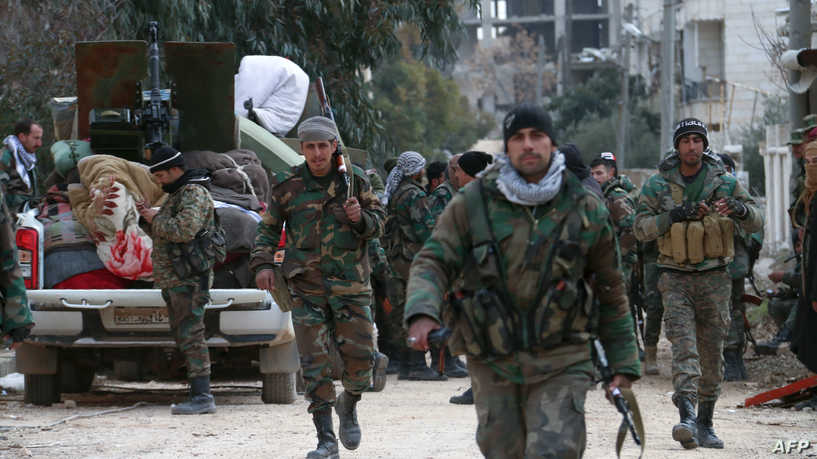 Members of the Syrian army deploy in the al-Rashidin 1 district, in Aleppo's southwestern countryside, on February 16, 2020. - Syrian regime forces made new gains in their offensive against the last major rebel bastion in the northwest, seizing villages and towns around second city Aleppo, state media and a monitor said. (Photo by - / AFP)