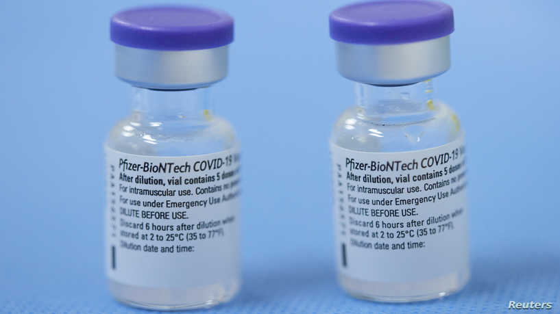 FILE PHOTO: Vials of the Pfizer-BioNTech vaccine are pictured in a vaccination centre in Geneva, Switzerland, February 3, 2021.      REUTERS/Denis Balibouse/File Photo/File Photo