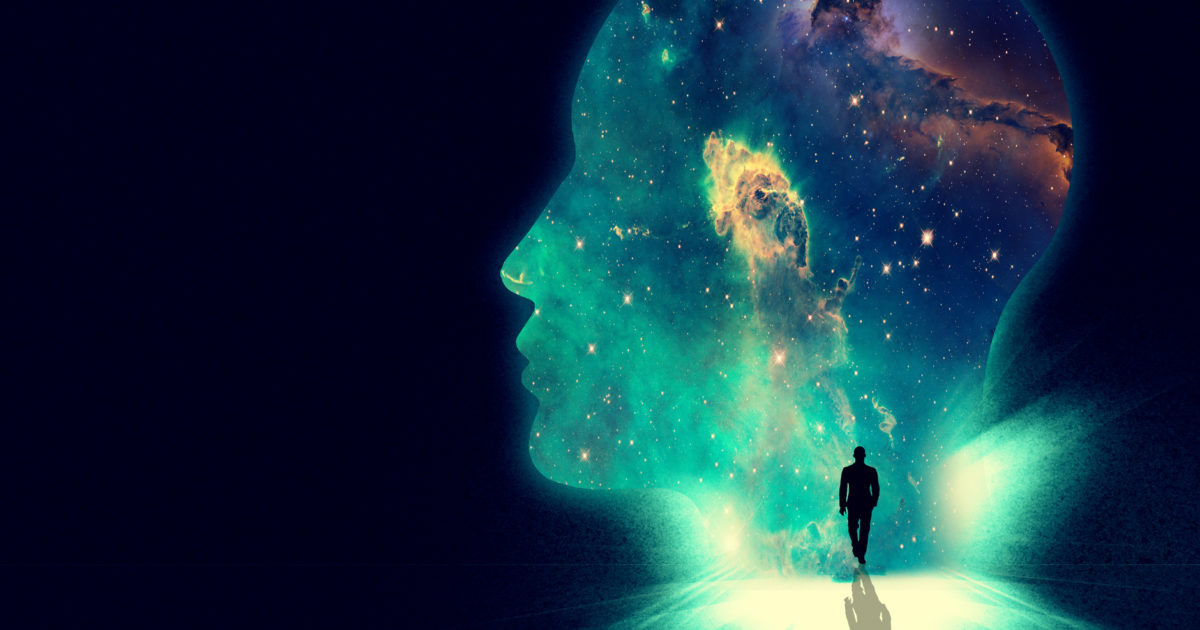 Illustration of a man walking towards a huge shape of a person's head overlaid with an image of the cosmos