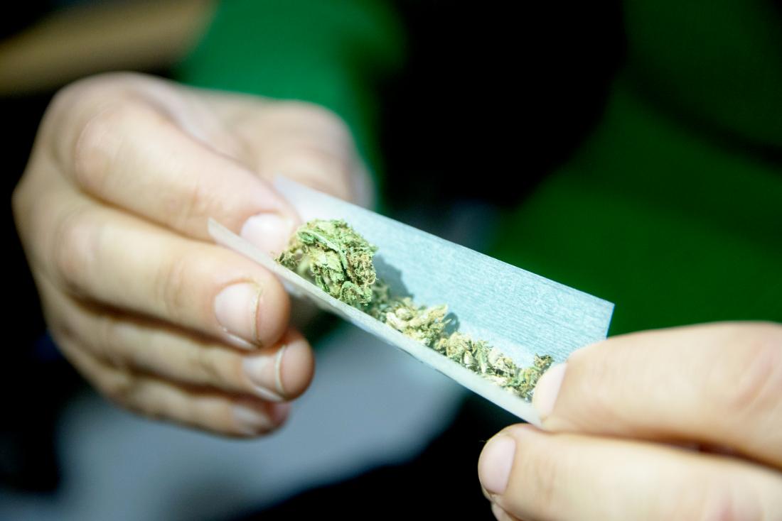 female-hands-rolling-a-marijuana-joint-that-might-kill-you