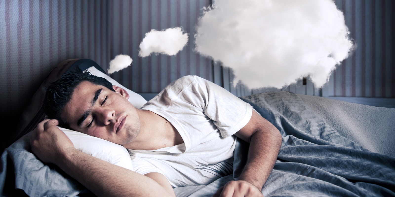 Man comfortably sleeping in his bed at night; Shutterstock ID 56412598; PO: aol; Job: production; Client: drone
