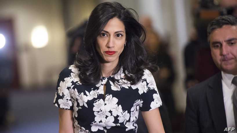 Huma Abedin, longtime aide to former US Secretary of State and Democratic presidential hopeful Hillary Clinton, returns after a break to speak to the House Select Committee on Benghazi on Capitol Hill in Washington, DC, October 16, 2015. Abedin is testifying behind closed doors Friday before a controversial congressional committee probing a deadly 2012 attack on a US mission in Libya, the panel said.   AFP PHOTO / SAUL LOEB (Photo by SAUL LOEB / AFP)