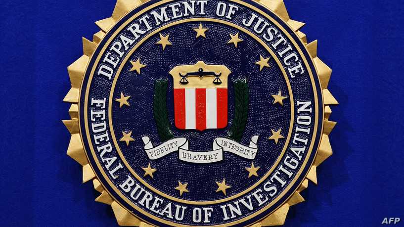 The Federal Bureau of Investigation (FBI) seal is seen on the lectern following a press conference announcing the FBI's 499th and 500th additions to the "Ten Most Wanted Fugitives" list on June 17, 2013 at the Newseum in Washington, DC. AFP PHOTO/Mandel NGAN (Photo by Mandel NGAN / AFP)