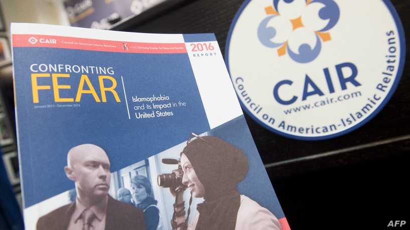 A report titled "Confronting Fear," about Islamophobia in the US released by the Council on American-Islamic Relations (CAIR), is seen at their headquarters in Washington, DC, June 20, 2016. (Photo by SAUL LOEB / AFP)