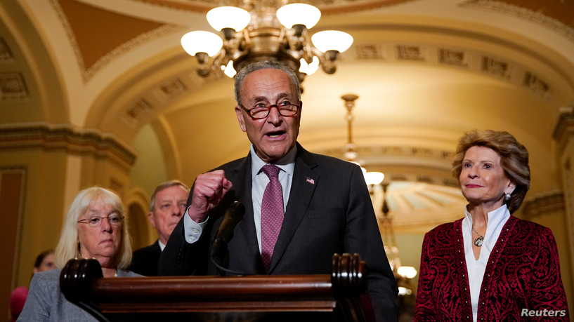 U.S. Senate Majority Leader Chuck Schumer (D-NY) is flanked by Senators' Patty Murray (D-WA), Dick Durbin (D-IL) and Debbie Stabenow (D-MI) as he talks to reporters following the Senate Democrats weekly policy lunch at the U.S. Capitol in Washington, U.S., July 13, 2021.  REUTERS/Elizabeth Frantz