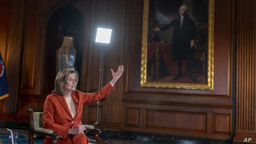 Speaker of the House Nancy Pelosi, D-Calif., talks to The Associated Press about the impact of the Jan. 6 attack by rioters loyal to then-President Donald Trump, on Capitol Hill in Washington, Wednesday, Jan. 5, 2022. (AP Photo/J. Scott Applewhite)