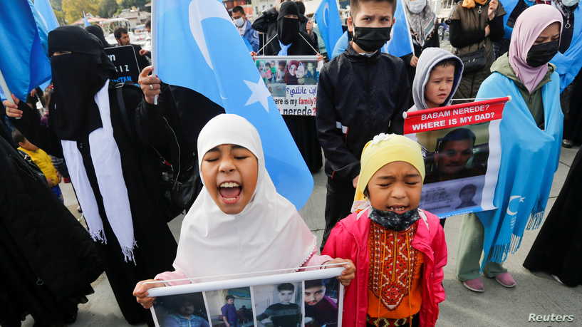 Ethnic Uighur demonstrators take part in a protest against China, in Istanbul, Turkey, October 1, 2021. REUTERS/Dilara Senkaya