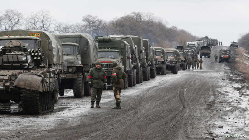 A view shows a military convoy of armed forces of the separatist self-proclaimed Luhansk People's Republic (LNR) on a road in the Luhansk region, Ukraine February 27, 2022. REUTERS/Alexander Ermochenko