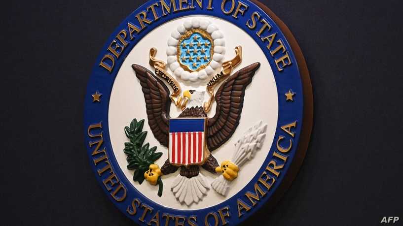 The State Department seal is seen on the briefing room lectern ahead of a briefing by State Department spokesperson Ned Price at the State Department in Washington, DC, on January 31, 2022. (Photo by MANDEL NGAN / POOL / AFP)