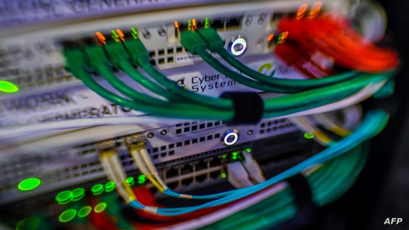 A photo shows servers specialised in cyber security during the 10th International Cybersecurity Forum in Lille on January 23, 2018. (Photo by PHILIPPE HUGUEN / AFP)