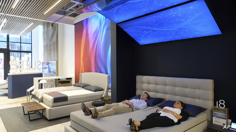 IMAGE DISTRIBUTED FOR SLEEP NUMBER - Unique to the Manhattan store, customers can take a 3-minute immersive "ride" into the science behind the 360 smart bed and understand how Sleep Number's technology delivers proven quality sleep at Sleep Number's new Flatiron store on Thursday, Aug. 9, 2018 in New York. (Charles Sykes/AP Images for Sleep Number)
