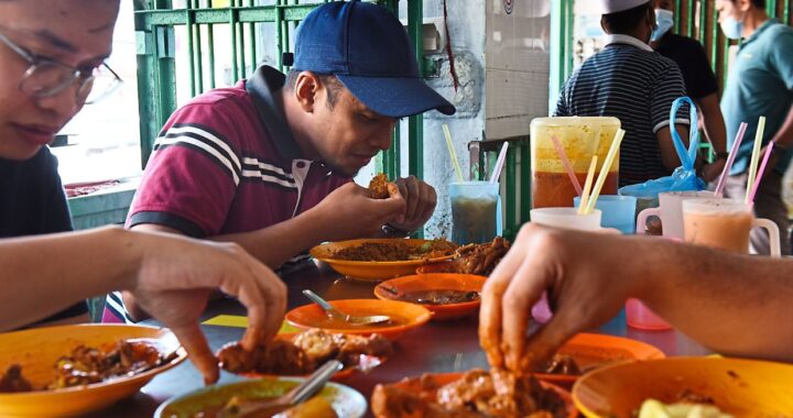 Brief Caption: Customers enjoying their food with hands at a restaurant in Queens Street ,George Town,Penang.. //(MARCH 09, 2021 ) — K.T.GOH/The Star