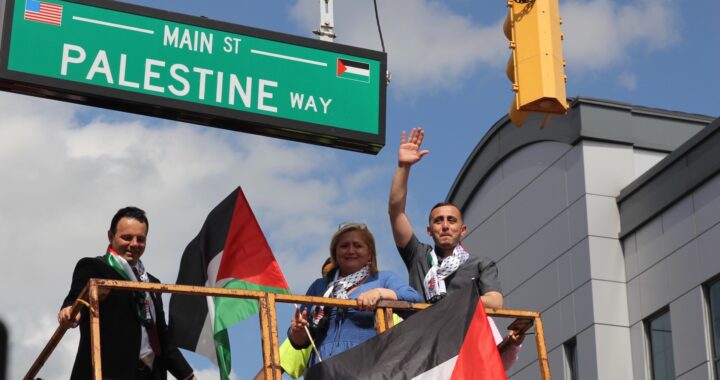 Paterson City Mayor Andre Sayegh, City Council President Maritza Davila, and Councilman Alaa Abdelaziz pose next to the new Palestine Way Sign - MEE, Reem Farhat
